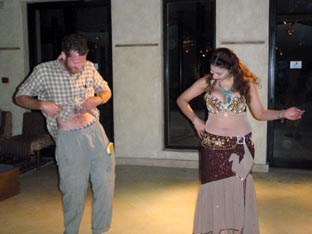 Alex, Lo's crew, checking his belly dancing gear